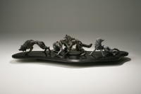 "Pack Track"
Cast bronze prowling wolves on a black granite base